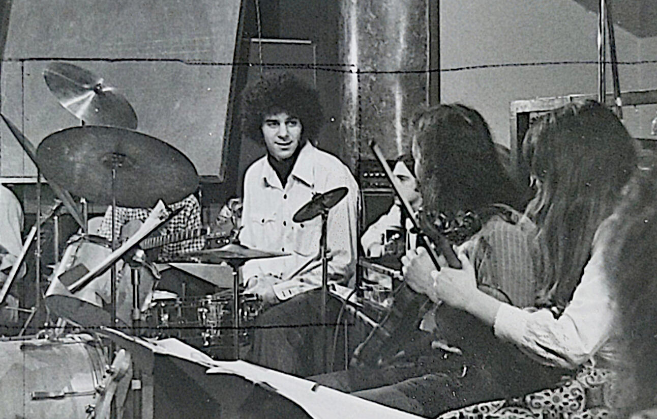 This is me at the drums in the band that started Blue Bear School of Music in 1971. This photo is from a gig we had at The Great Amercan Music Hall in 1972.
